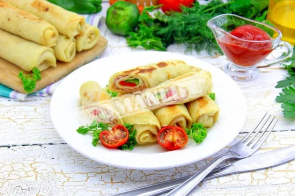 Млинці з ковбасою та сиром