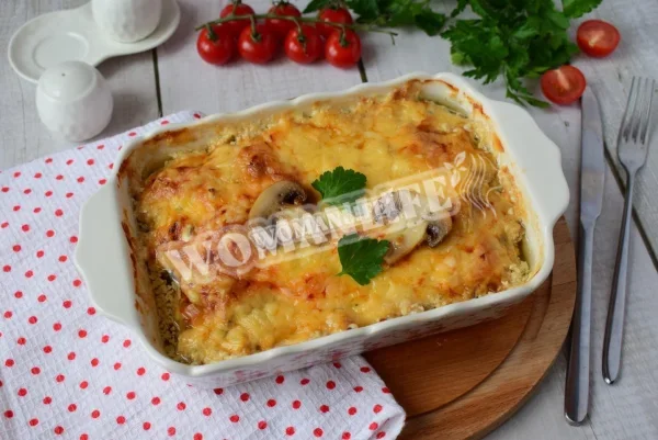 Гриби в духовці з сиром і куркою