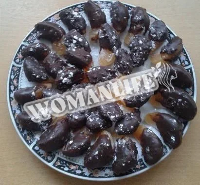 Скибочки мандарина в шоколаді