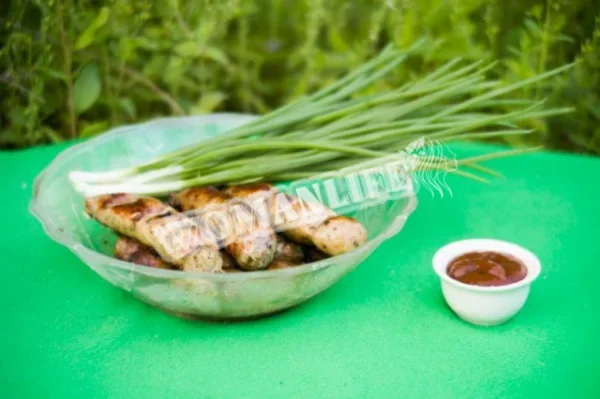 Мариновані курячі купати на вогні