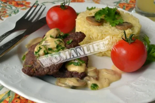 Телятина з грибами