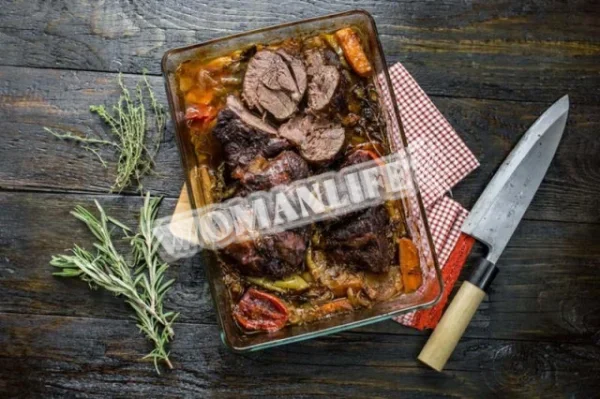 Запечена яловича гомілка з овочами в пиві