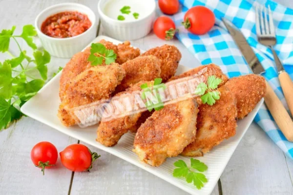 Курячі крильця в хрусткій паніровці на сковороді