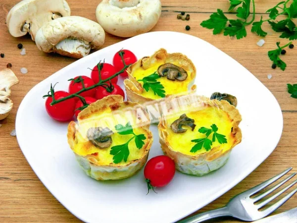 Тарталетки з грибами і сиром