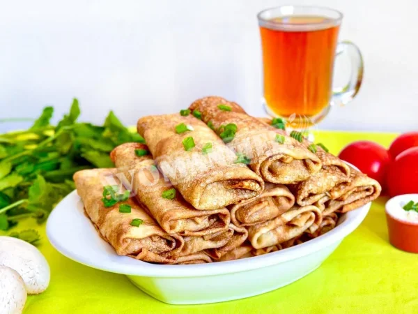 Млинці, фаршировані грибами