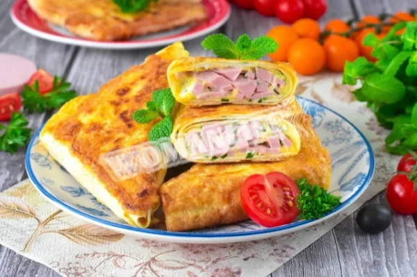 Конвертики з лаваша з ковбасою і сиром
