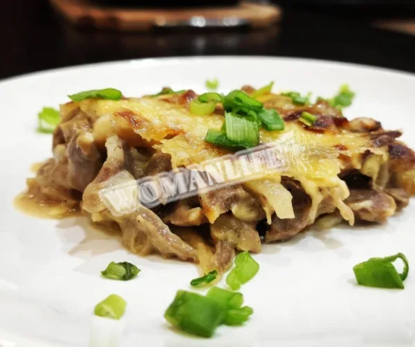 Курячі шлунки під сирною шапкою