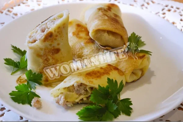 Млинці з фаршем зі свинини та яловичини