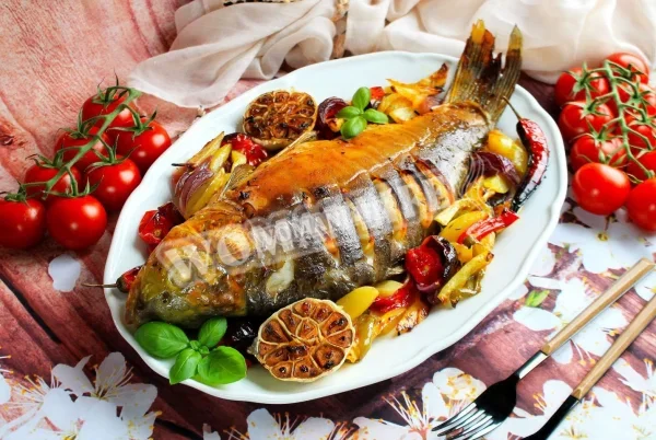 Короп, запечений в духовці з овочами
