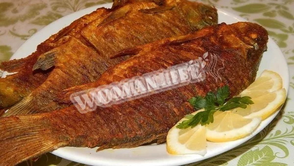 Фарширований смажений зимовий карась без кісток з картоплею