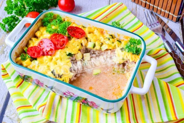 Кабачки з рисом і фаршем в духовці