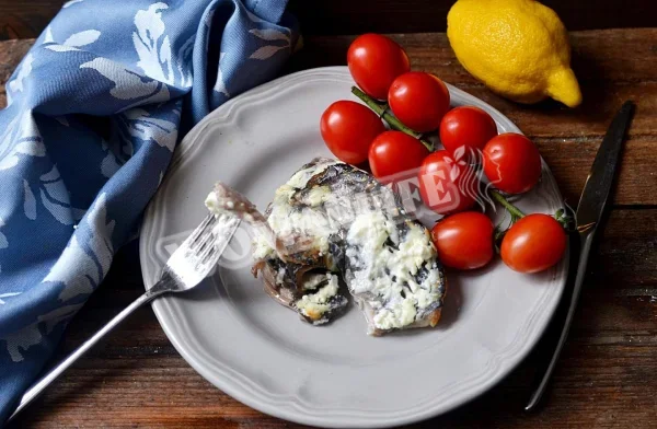 Сом з лимонами в сметані