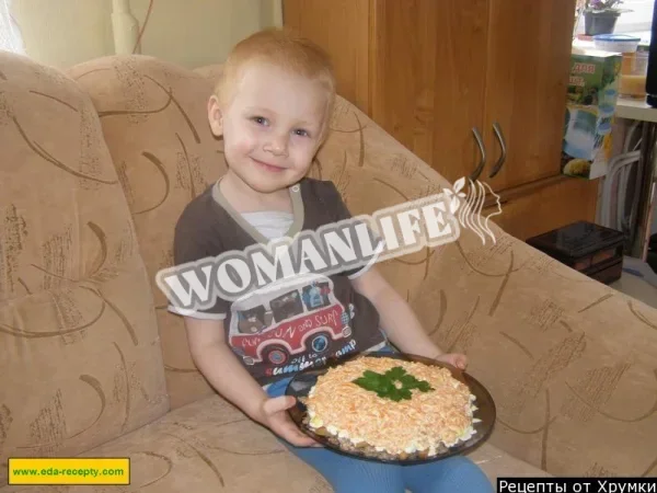 Салат зі шпротами і грінками