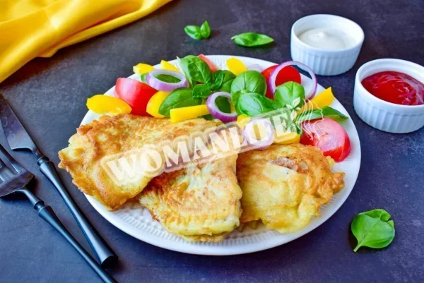 Тілапія на сковороді в клярі