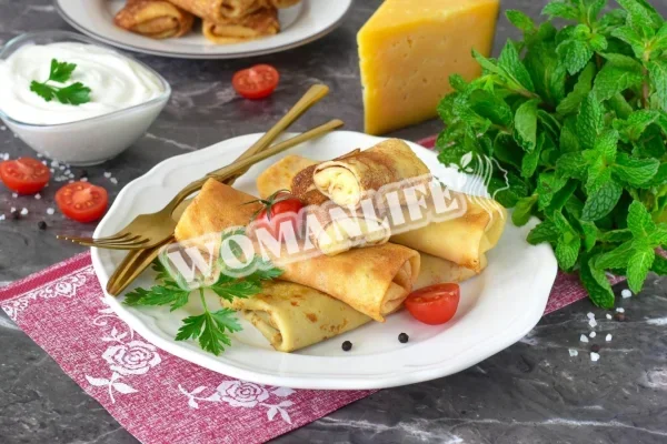 Млинці з сирною начинкою