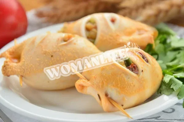 Кальмари, фаршировані овочами
