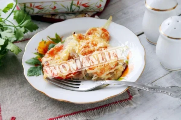 М'ясо по-французьки з сиром і помідорами в духовці
