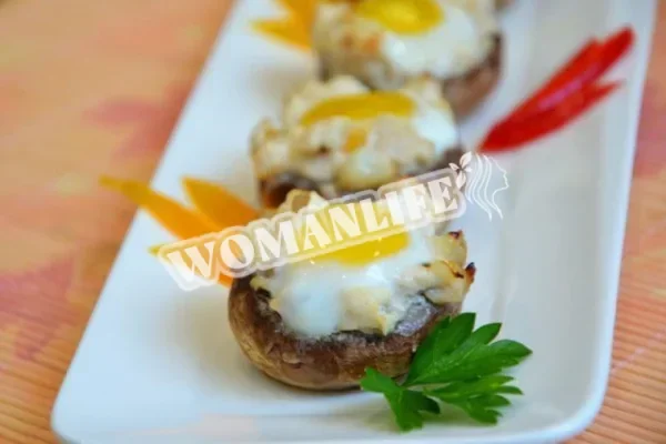 Печериці, фаршировані куркою в духовці