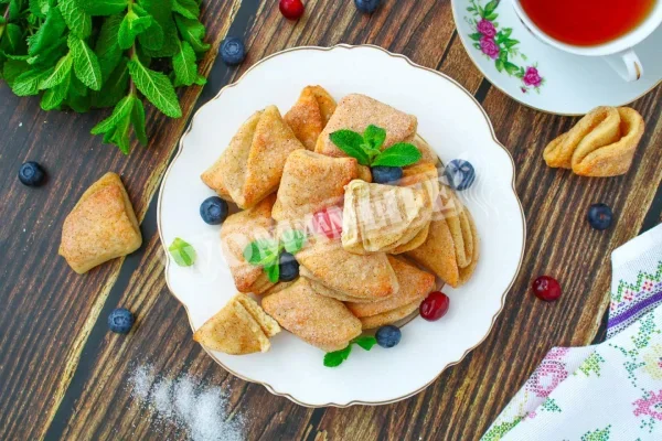 Сирне печиво вушка з цукром